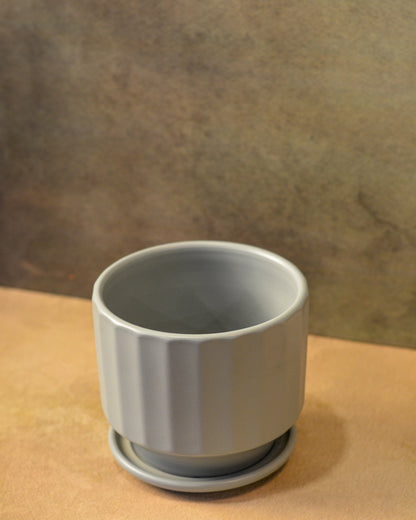 Fluted Ceramic Planter with saucer comes with a drainage hole, Grey